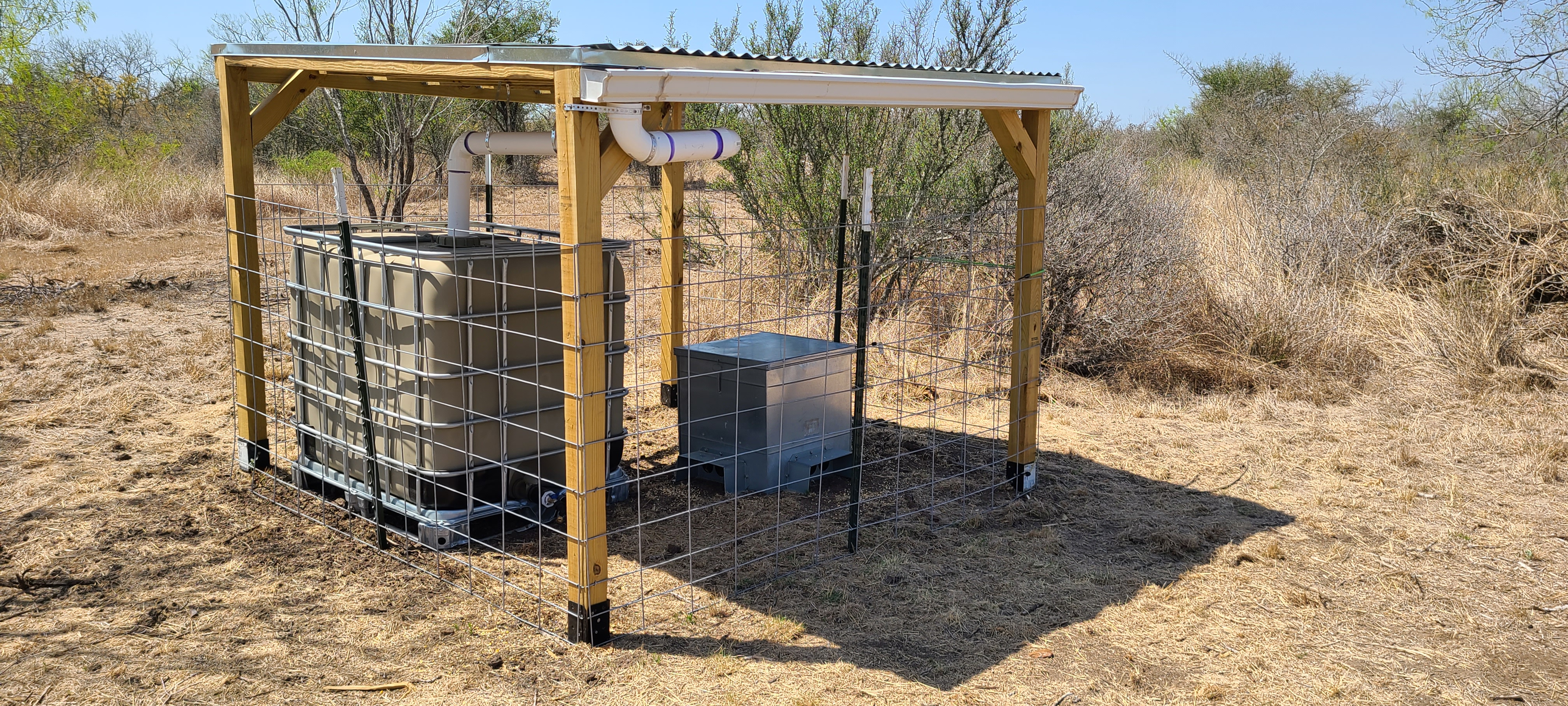 Rain harvest catchment watering station for wildlife on ranch property